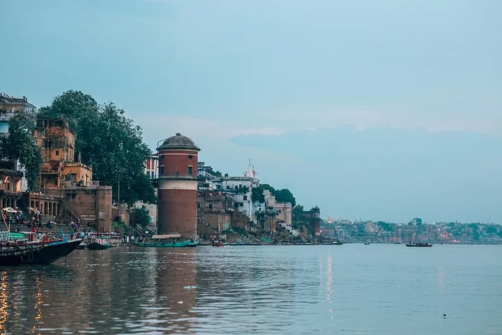 View of the historic ghats and buildings along the Ganges River.